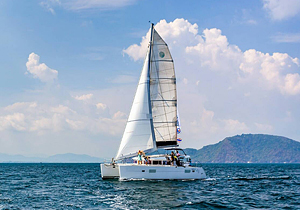 Racha Island, Coral Island and Promthep Cape Tour by Sailing Catamaran